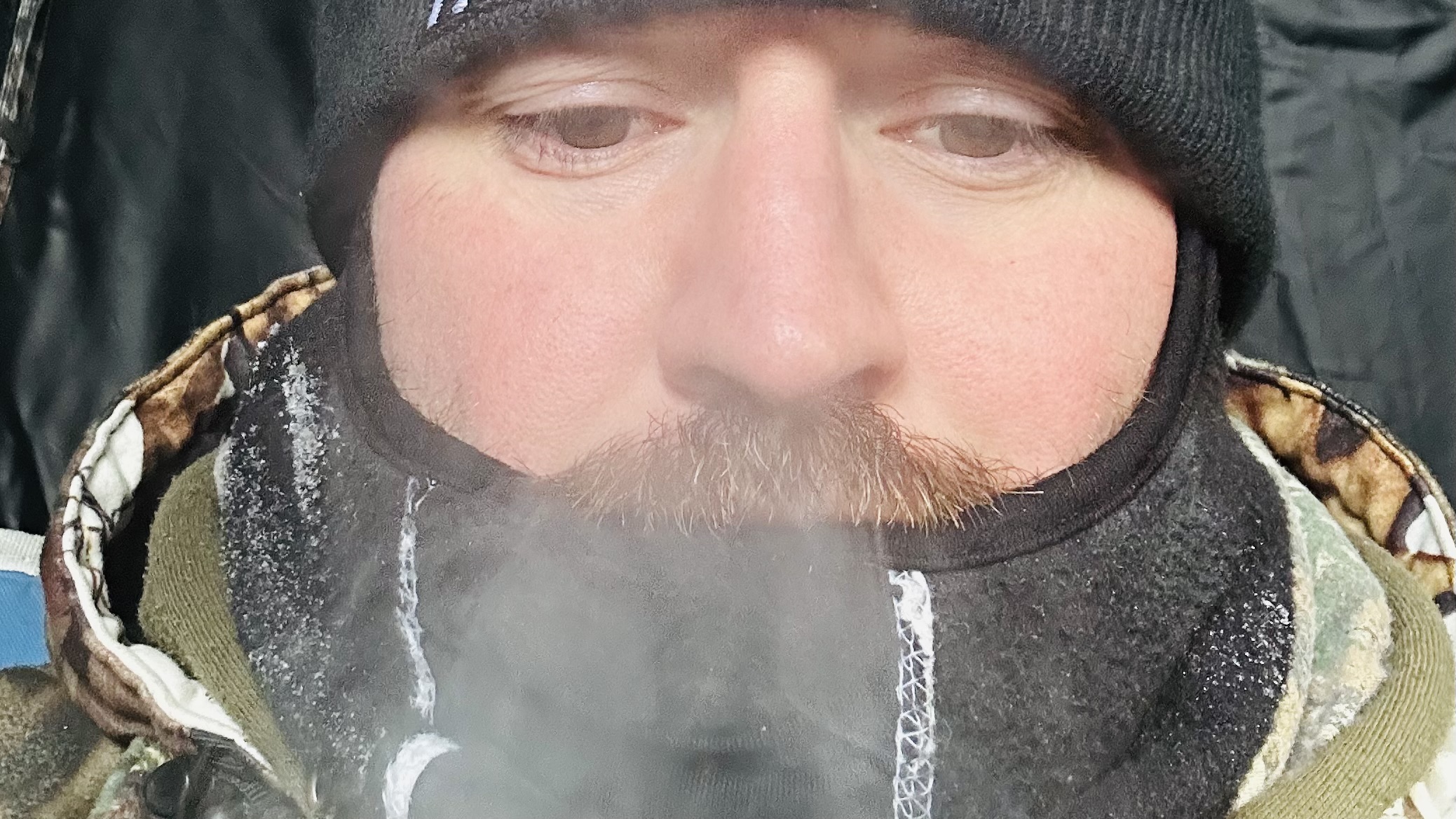Hunter in -30°C ground blind Ontario wolf hunt